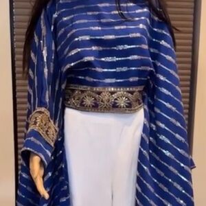 Blue embroidery top with white wide leg pants